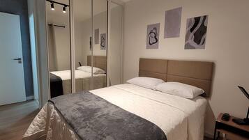 2 quartos, ferros/tábuas de passar roupa, Wi-Fi, roupa de cama