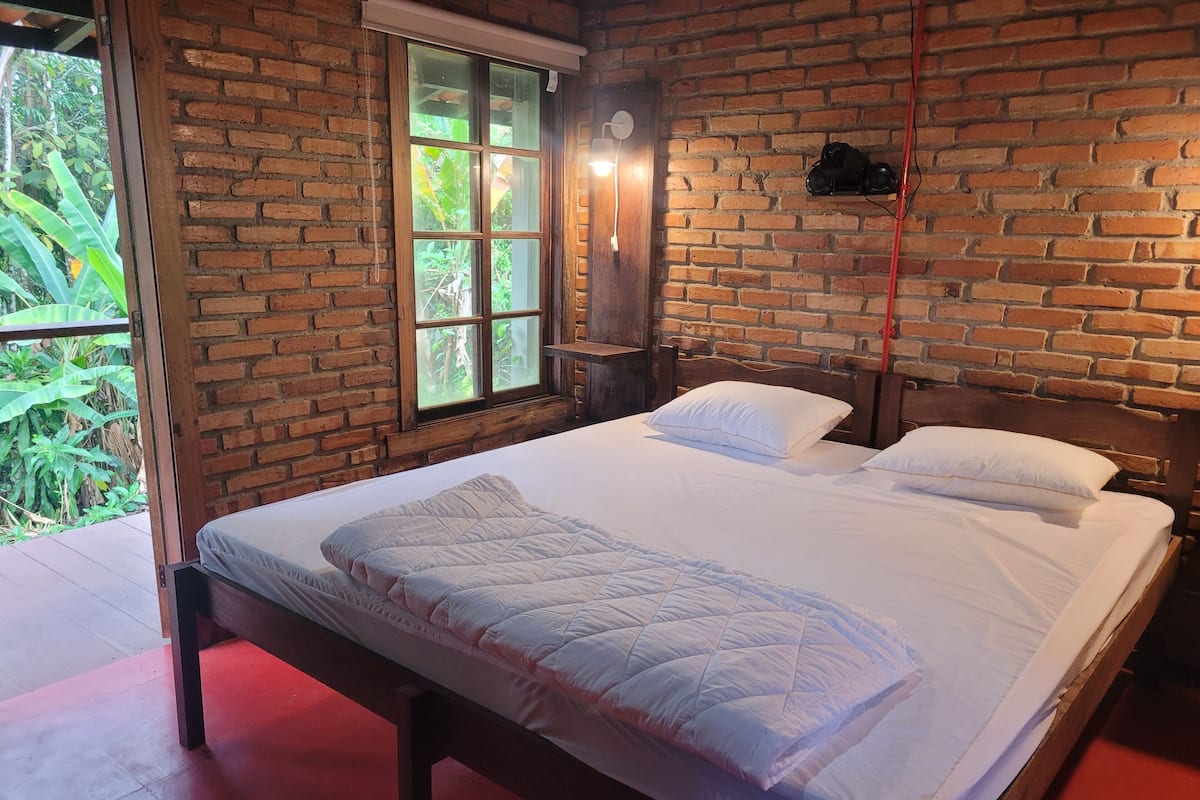 Suite básica, vista al jardín | 1 habitación y wifi gratis