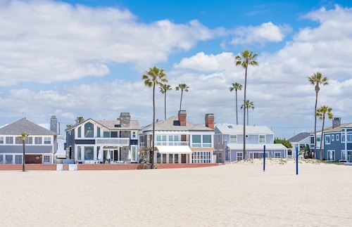 Modern 6BR Home w/ Three Large Patios & Central Location, One House from the Beach