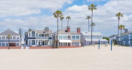 Modern 6BR Home w/ Three Large Patios & Central Location, One House from the Beach