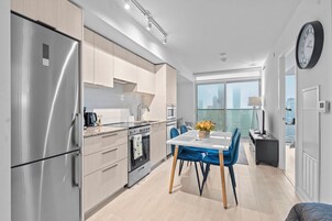Deluxe Apartment, Multiple Beds | Private kitchen