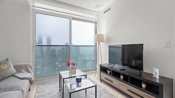 Deluxe Apartment, Multiple Beds | Living area | 43-inch flat-screen TV with digital channels, Netflix, Hulu