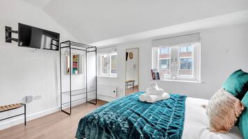 Iron/ironing board, travel crib, WiFi, bed sheets