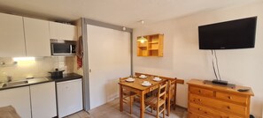 Fridge, microwave, cookware/dishes/utensils, spices