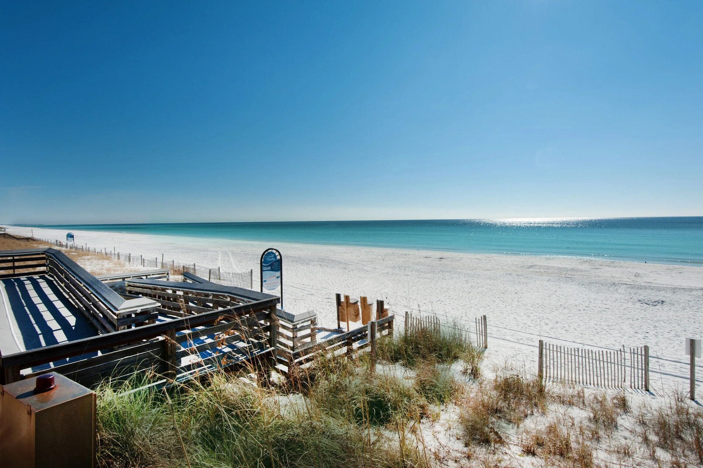 On the beach, sun-loungers