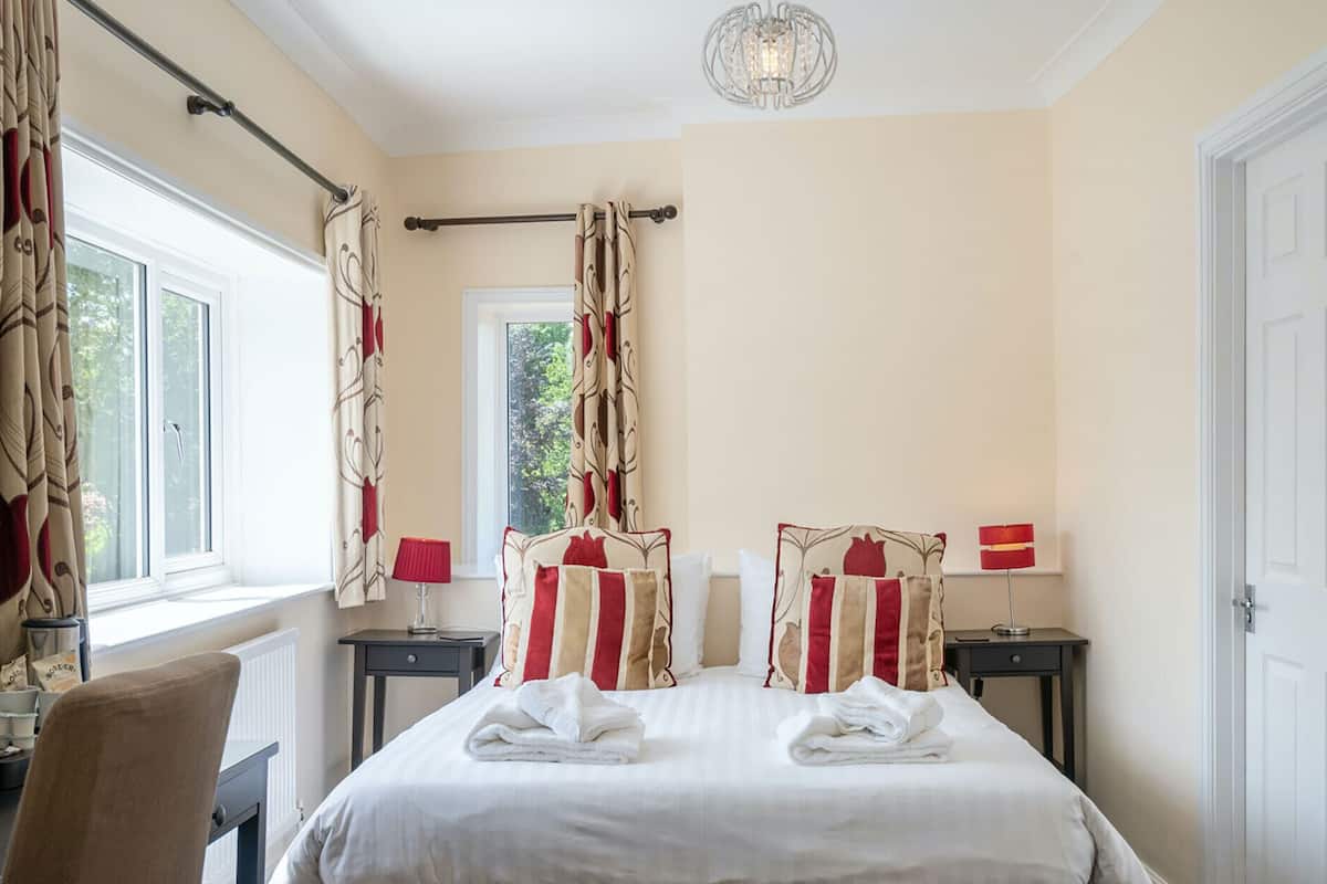 Suite Deluxe, bagno in camera, vista giardino (BH1) | 2 camere, Wi-Fi gratuito