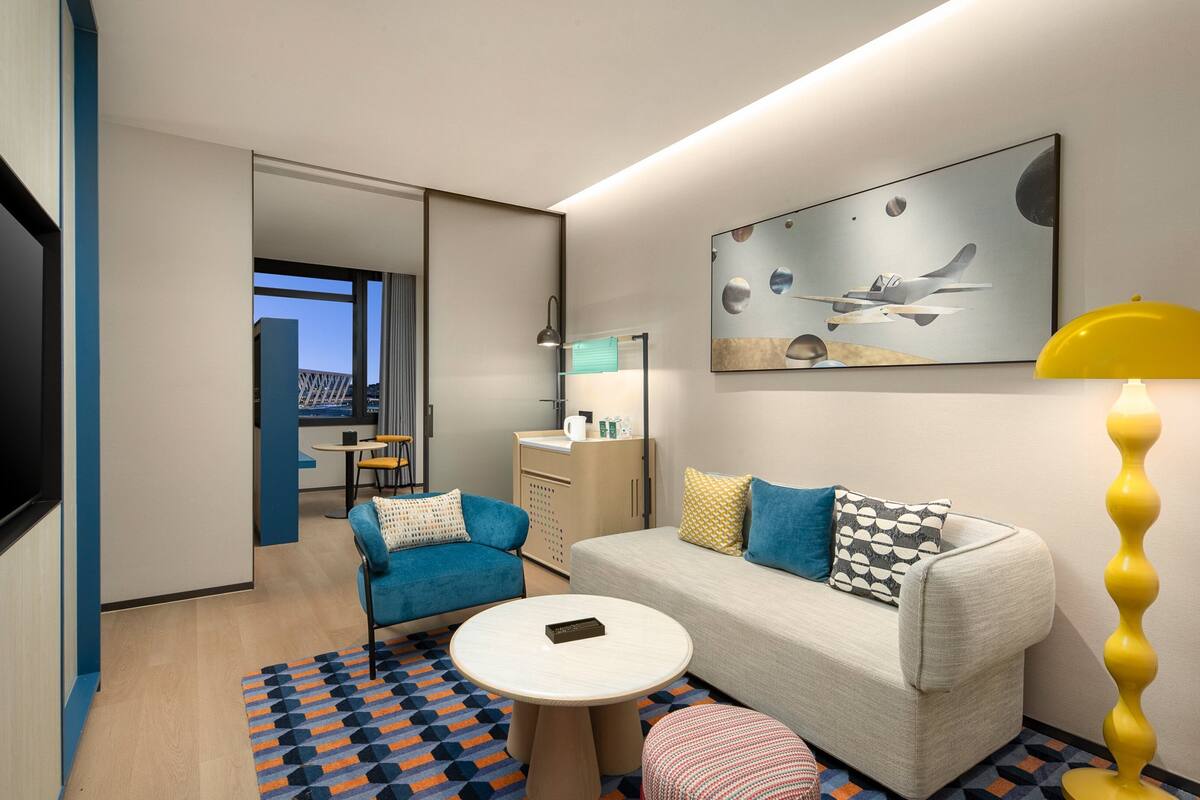 Suite, 1 King Bed | Down comforters, in-room safe, laptop workspace, blackout drapes