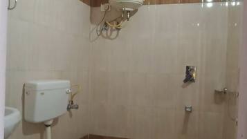 Dusj, håndklær, såpe og sjampo