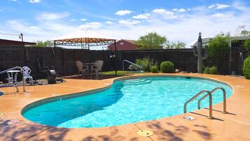 Outdoor pool, open 9:00 AM to 11:00 PM, free pool cabanas