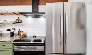 Fridge, microwave, oven, stovetop - Aspen Glow Cabin - a charming 2-bedroom cabin with mountain views & wood stove (Bailey)