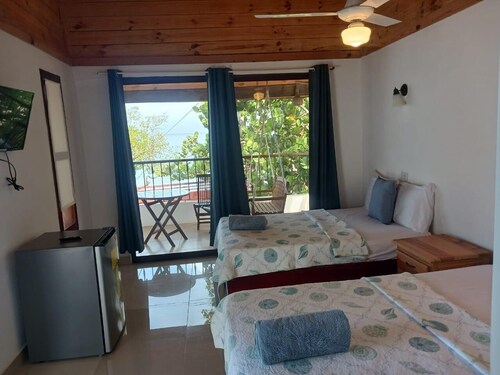 Beach Front 1-bedroom apartment with WiFi, AC in fantastic Punta Rucia