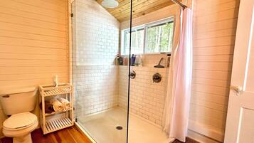 Shower, towels, soap, toilet paper