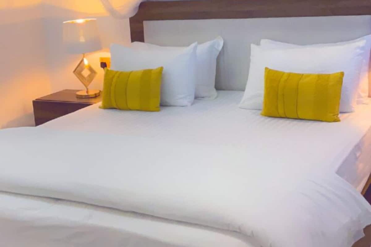 Classic Double Room, Courtyard View | Iron/ironing board, WiFi (free), bed sheets