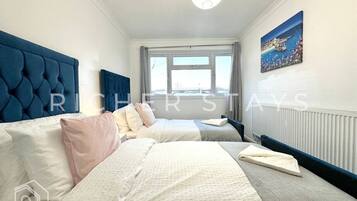 3 bedrooms, desk, iron/ironing board, travel crib