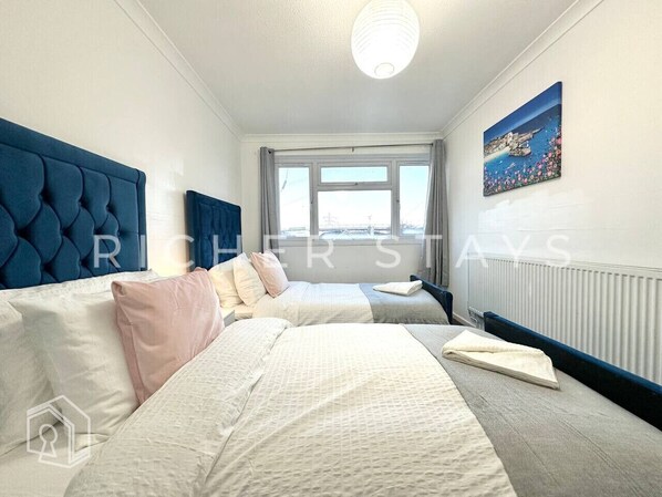 3 bedrooms, desk, iron/ironing board, travel cot