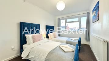 3 bedrooms, desk, iron/ironing board, travel cot