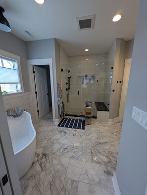 Shower, hair dryer, towels, soap