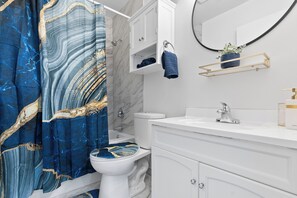 Hair dryer, towels, soap, toilet paper