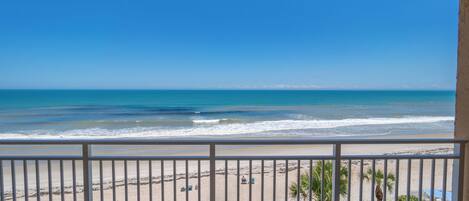 On the beach, sun loungers, beach towels