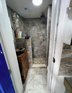 Shower, hair dryer, towels, soap