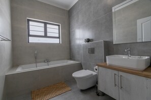 Hair dryer, towels, soap, shampoo