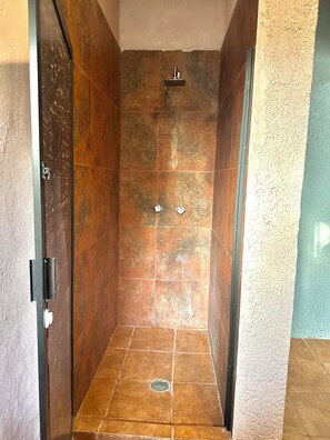 Panoramic Triple Room, Garden View | Bathroom | Shower, towels, soap, shampoo