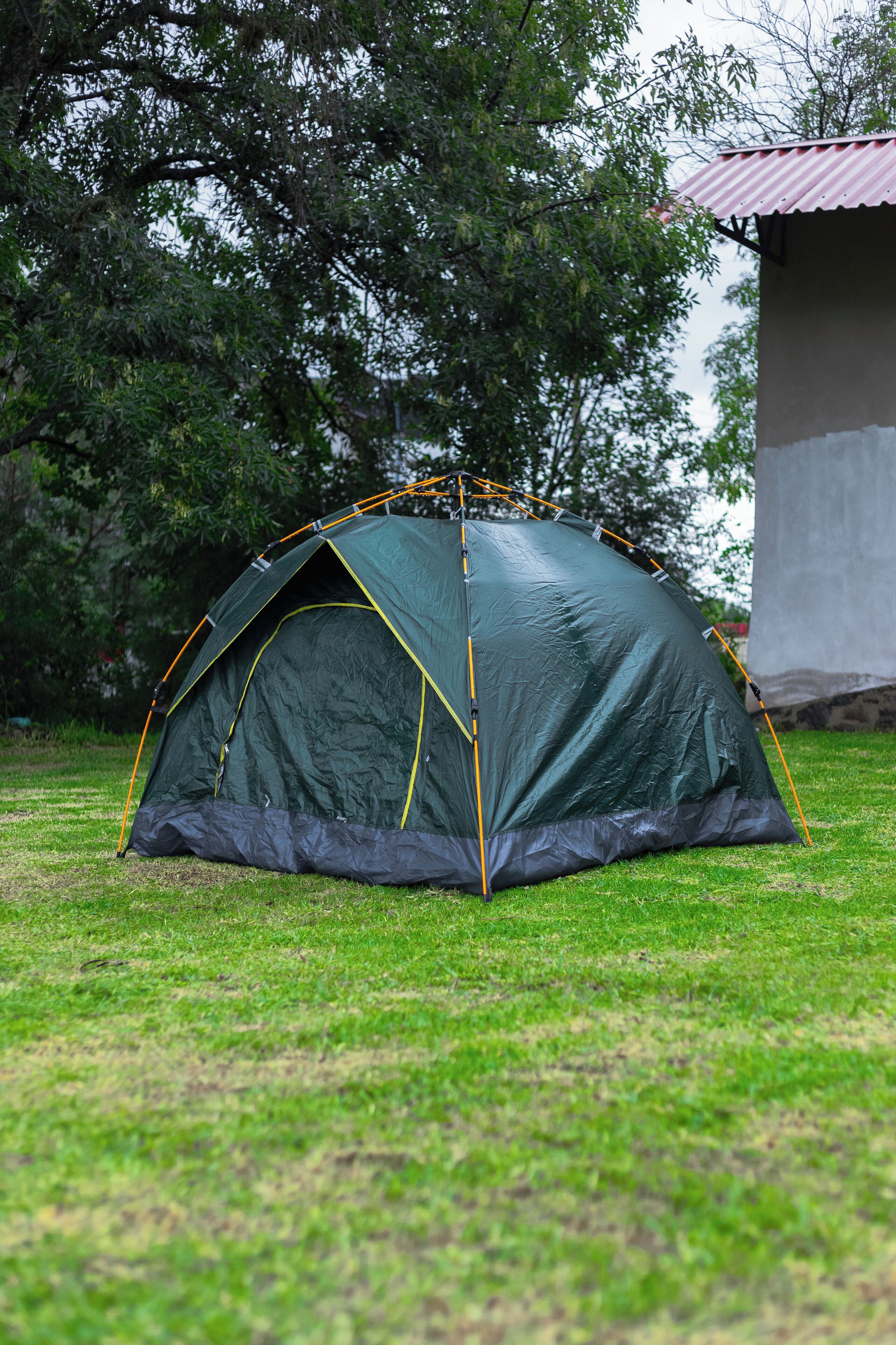 Economy Tent | Down comforters, laptop workspace, free WiFi, bed sheets