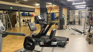 A gym with cardio equipment, weight machines, and exercise balls. -  1-bedroom condo in Long Beach with 2 private patios.  (Long Beach)