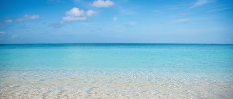On the beach, sun-loungers, beach towels