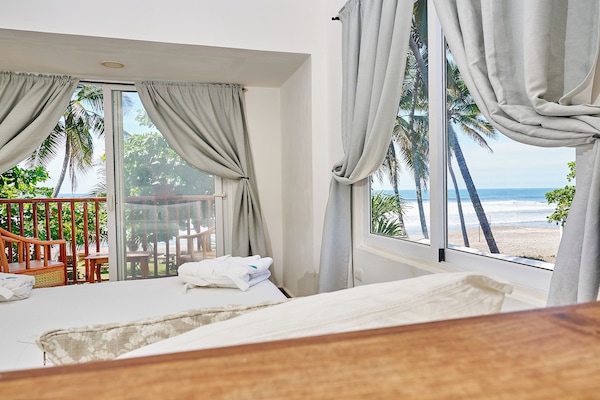 Deluxe Double Room, Sea View, Oceanfront (A) | Blackout drapes, free WiFi, bed sheets