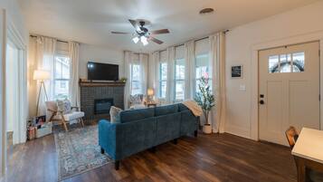 Smart TV, fireplace, books