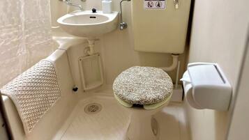 Hair dryer, soap, shampoo, toilet paper