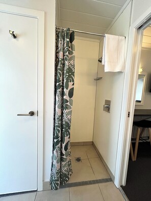 Shower, towels, soap, shampoo