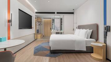 Down comforters, desk, blackout drapes, soundproofing