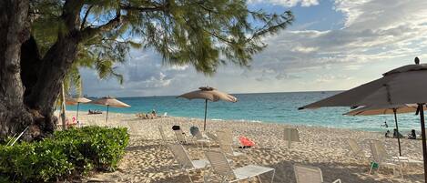 On the beach, sun-loungers, beach towels