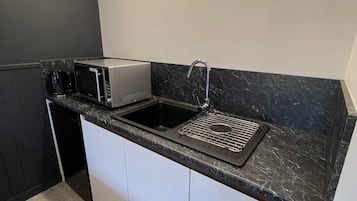 King & Single Room Plus Kitchenette | Desk, laptop workspace, blackout drapes, soundproofing
