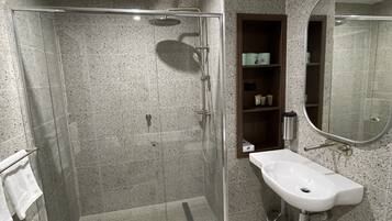 Deluxe Quadruple Room, Patio, Golf View | Bathroom | Separate bathtub and shower, free toiletries, towels, soap