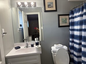 Hair dryer, towels, soap, shampoo