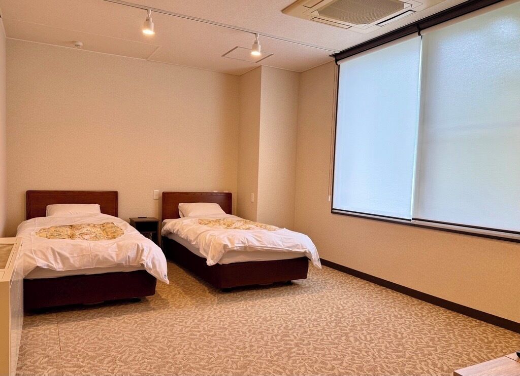 Habitación senior | Wifi gratis y ropa de cama 