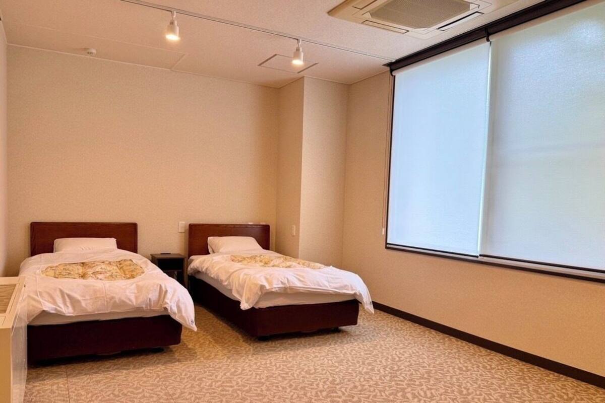 Chambre Sénior | Wi-Fi gratuit, draps fournis