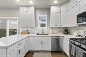 Fridge, microwave, oven, stovetop - #HabitueHomes - The Stone's Throw (Boise)