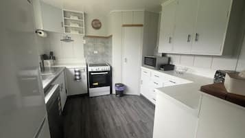 Microwave, stovetop, dishwasher, paper towels