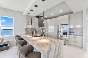 Fridge, microwave, oven, stovetop - Key Largo Oasis Oceanfront with Pool & Hot Tub (Key Largo)