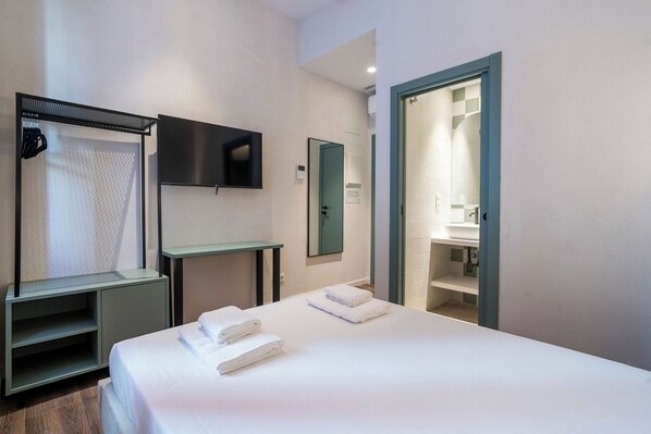 Iron/ironing board, travel crib, free WiFi, bed sheets