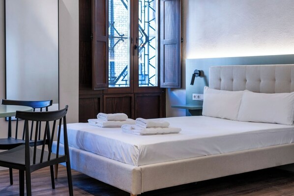 Iron/ironing board, travel crib, free WiFi, bed sheets