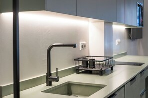 Fridge, microwave, stovetop, coffee/tea maker