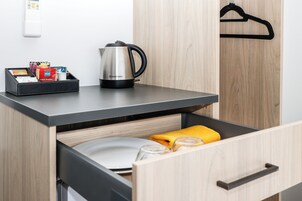 Premium bedding, pillow-top beds, blackout curtains, soundproofing