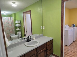 Hair dryer, towels, soap, shampoo