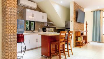 Deluxe Apartment, Patio | Private kitchen