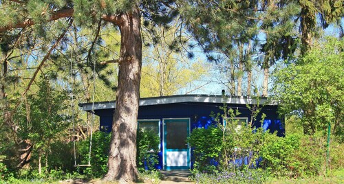 Blue Bungalow by the Lake with Boat, Private Terrace and Wi-Fi
